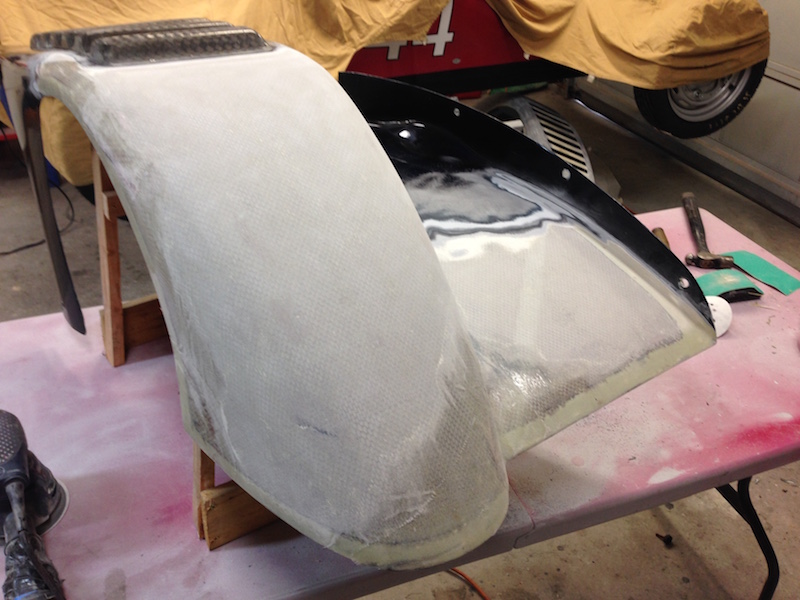 Sanding the right fender